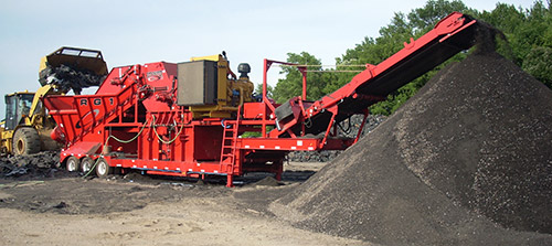 Rotochopper RG-1 Processing Asphalt Shingles.