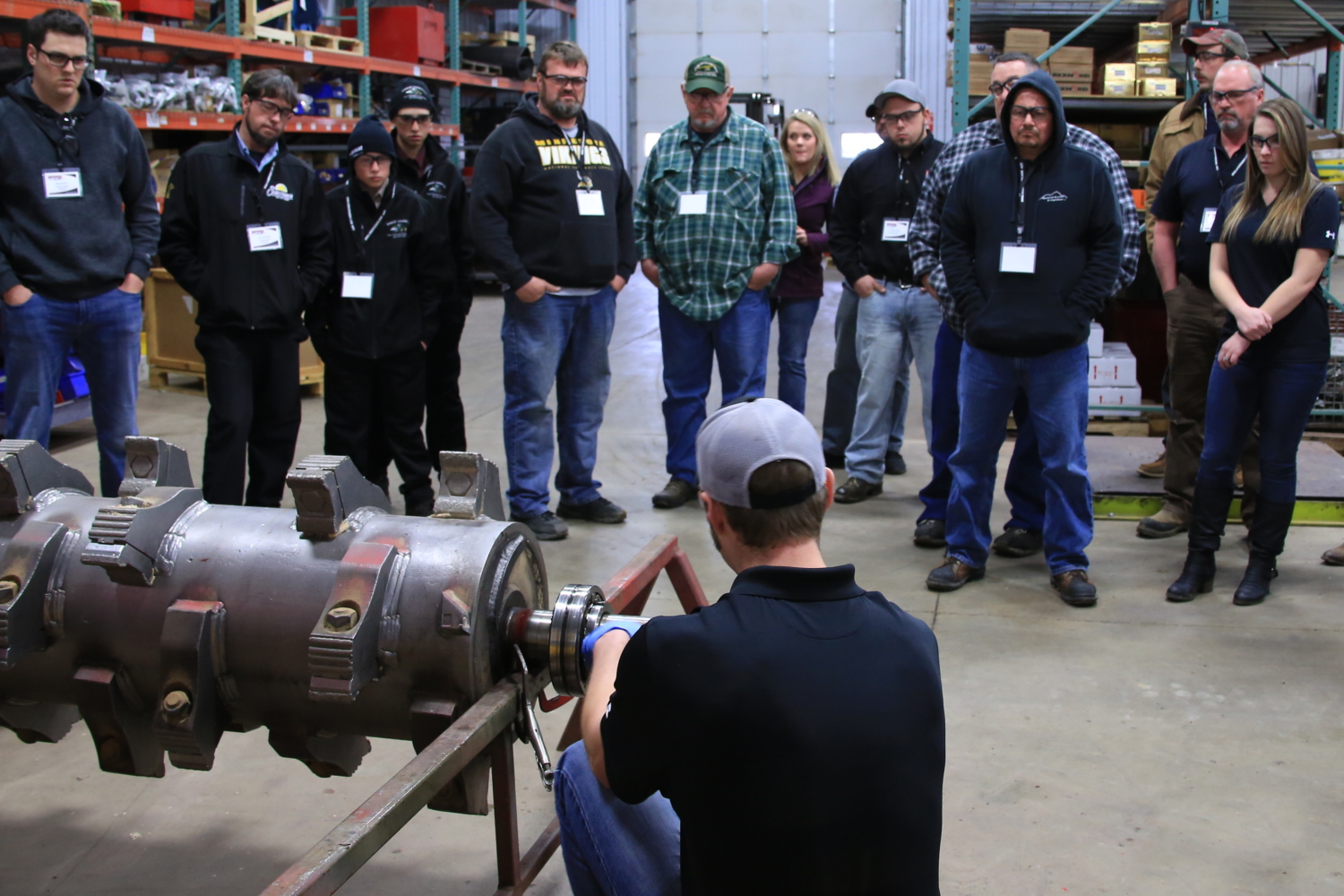 Adam Asmus, Rotochopper Customer Service Manager, demonstrates rotor bearing maintenance.