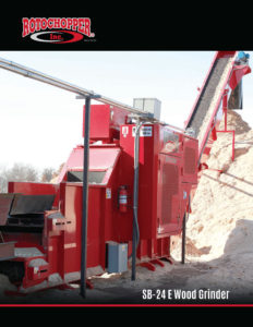 A slab wood waste grinder, called a SB-24 E Wood Grinder, sold by Rotochopper, at a wood mill.