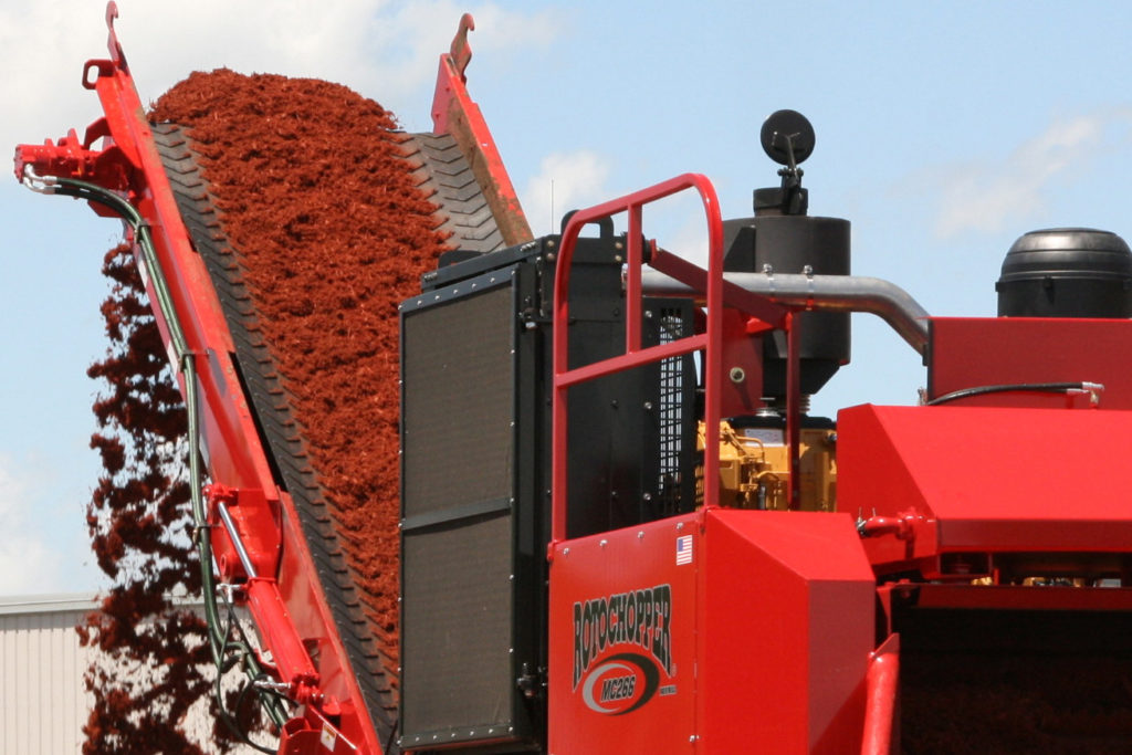 colored landscape mulch discharge