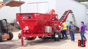 CP-118 wood chip processor coloring wood chips into brown colored mulch.