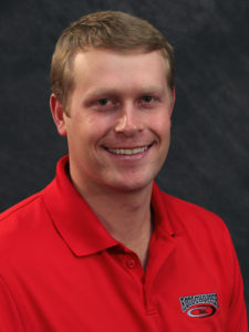 Member of Rotochopper's sales team Ryan Schams smiles for his portrait.