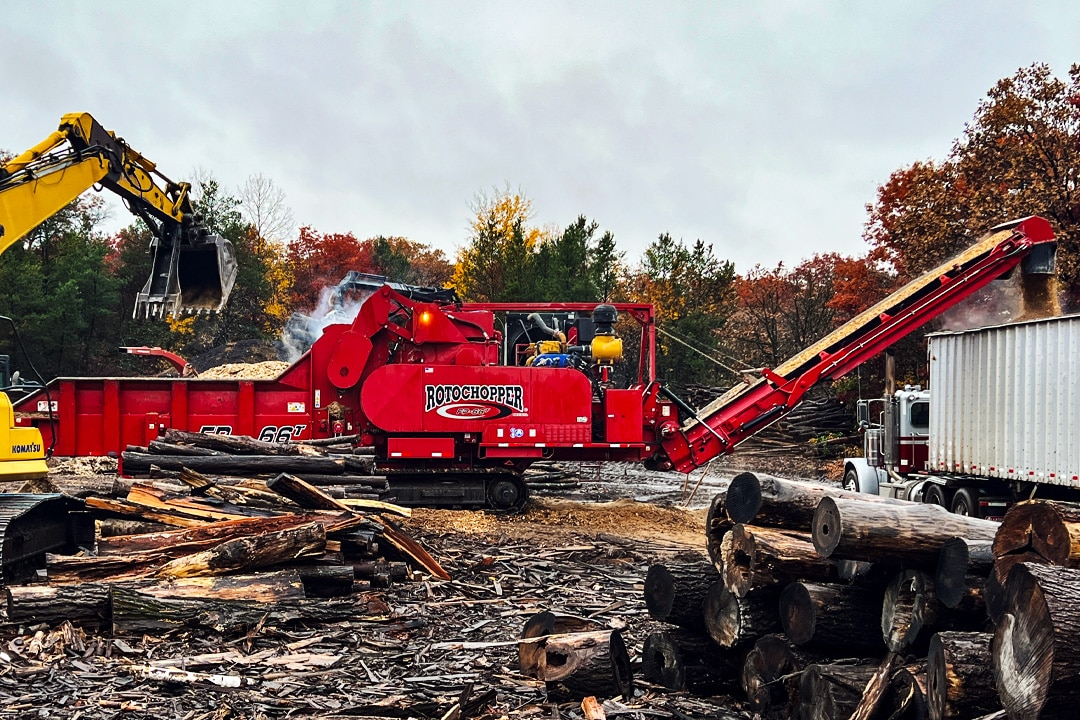 rotochopper fp66 horizontal grinder wood waste loading into trailer