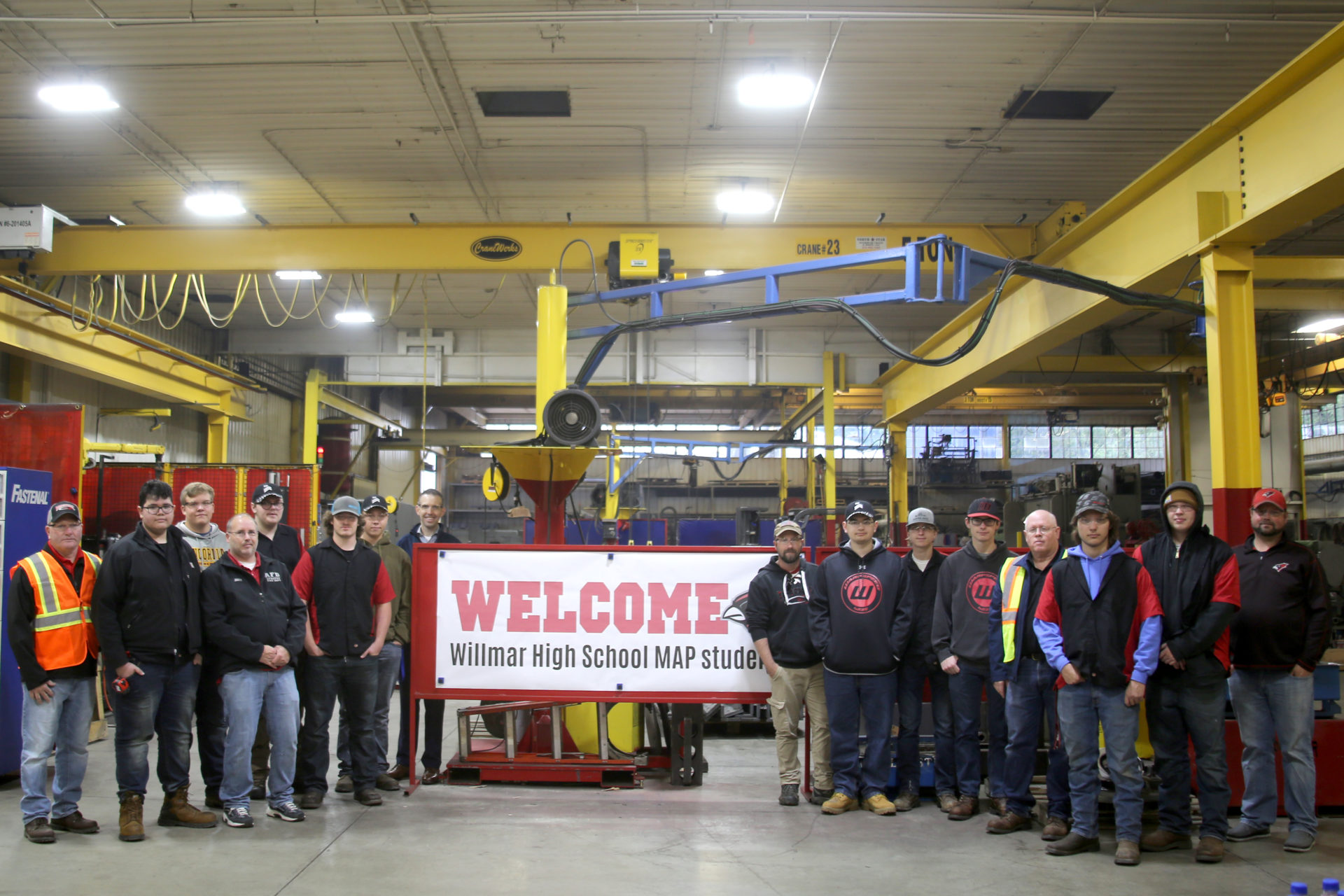 Willmar High School students pose for a group photo during a tour of the Rotochopper facility as part of their Manufacturing class.