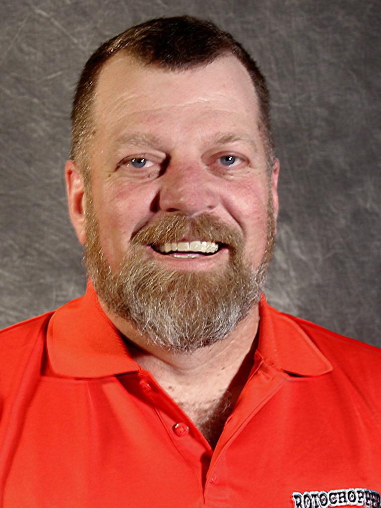 A member of Rotochopper's sales team David Woods smiles for his portrait.