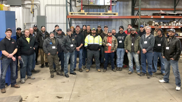 Machine owners from all over the country pose together at Rotochopper's Rotochopper University training event.