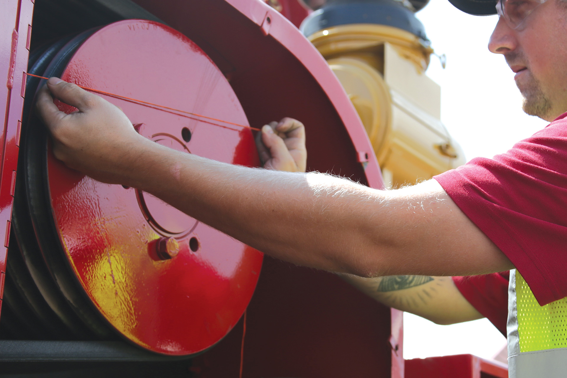 A Rotochopper service technician servicing a horizontal grinder.