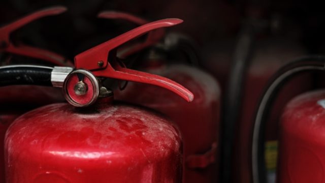 closeup of red fire extinguisher