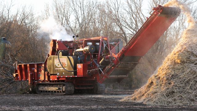 The Rotochopper B-66L on a land clearing job site.