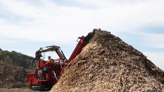 Rotochopper equipment being used to recycle wood waste