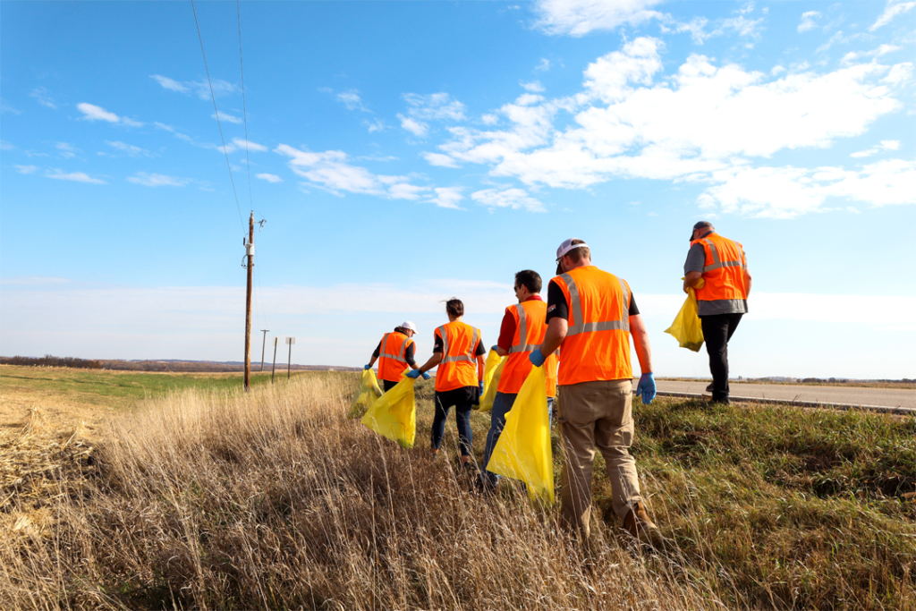 Rotochopper employees cleaning ditches for Adopt a Highway - VTO