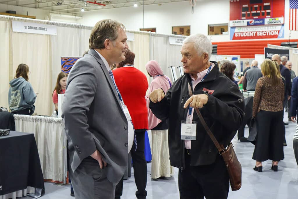 tosh and vince having a conversation at Granite Days event
